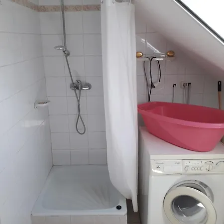 Közös Nevező Vendegház Casa de hóspedes